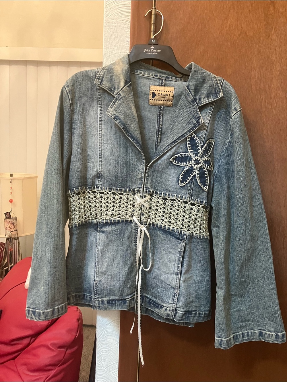 Crest Light Blue Denim Jacket with Crochet Waist and Floral Applique